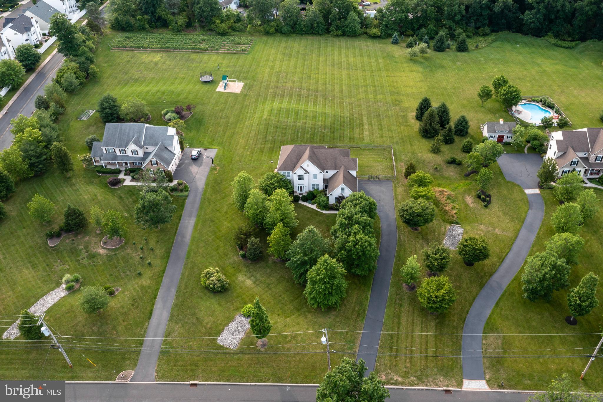 877 Church Road Harleysville, PA 19438 - Photo 47 of 48 an aerial view of a residential houses with outdoor space and trees all around