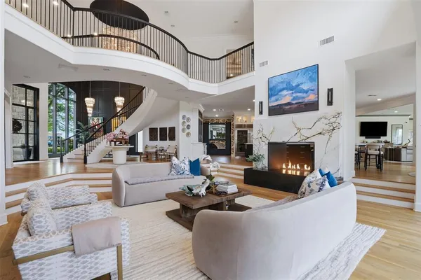 a view of a living room and a floor to ceiling window
