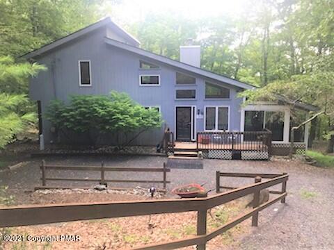 178 Edinburgh Road Bushkill, PA 18324 - Photo 1 of 54 a view of a house with backyard and sitting area