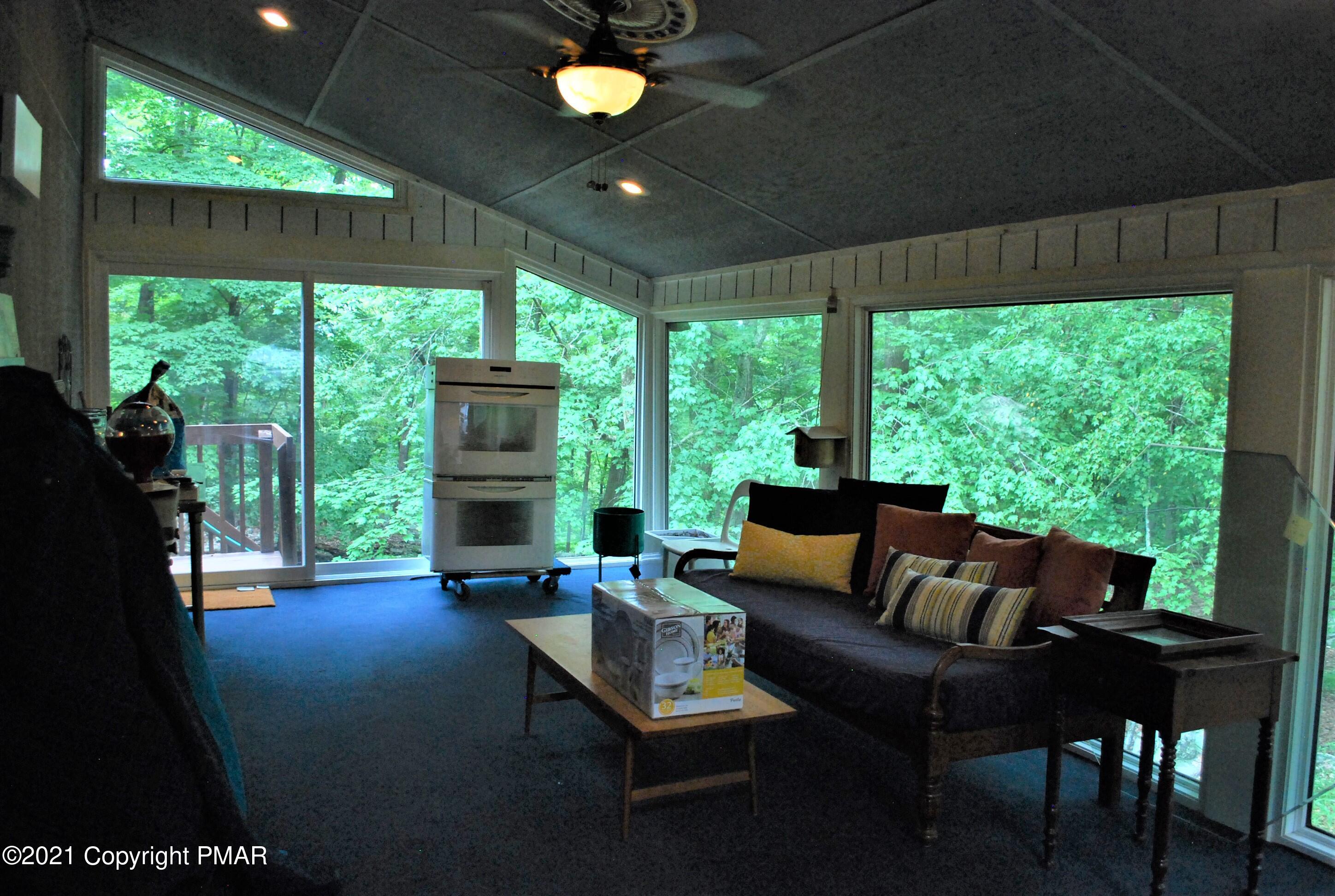 178 Edinburgh Road Bushkill, PA 18324 - Photo 45 of 54 a outdoor living space with furniture and garden view