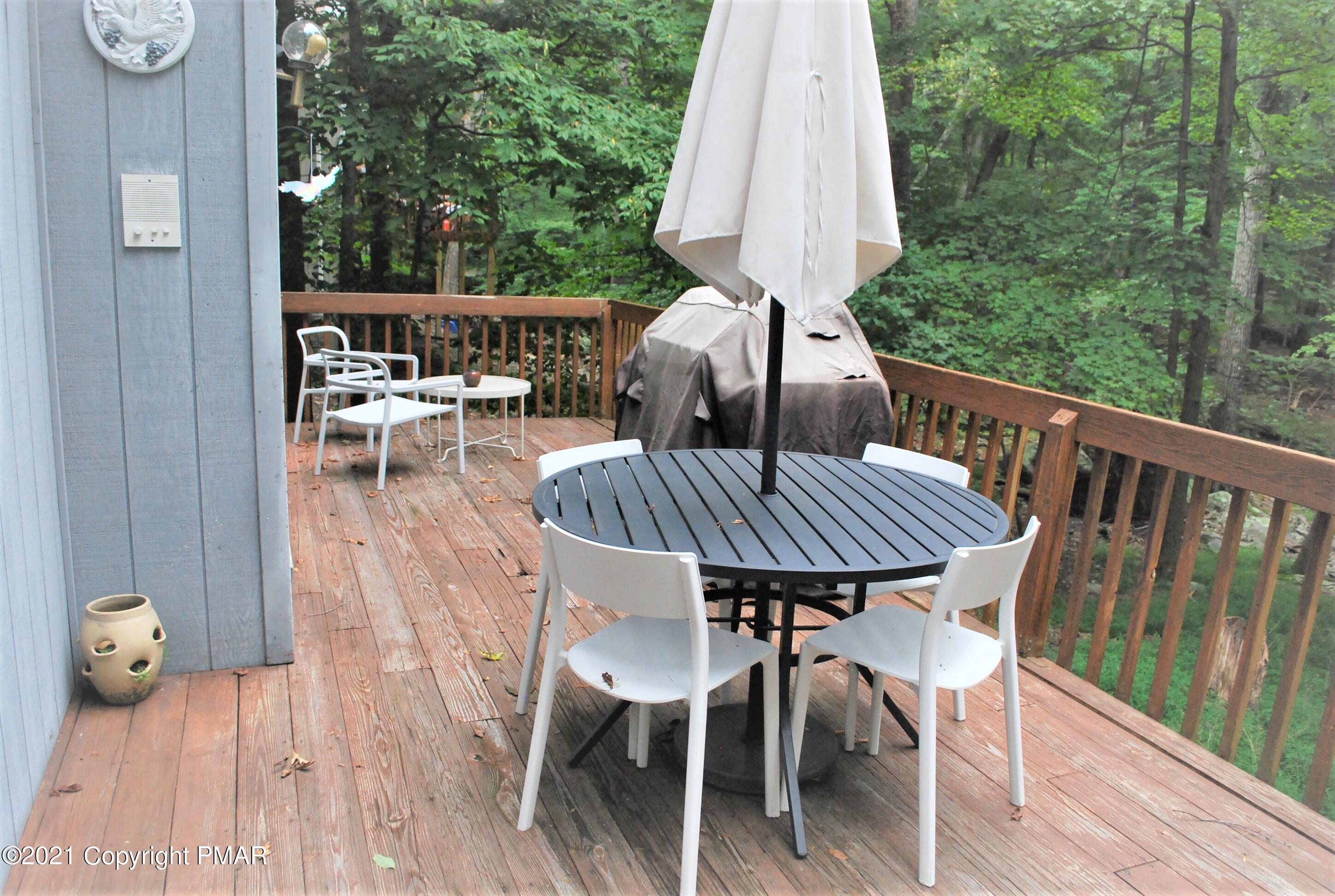 178 Edinburgh Road Bushkill, PA 18324 - Photo 47 of 54 a view of balcony with table and chairs