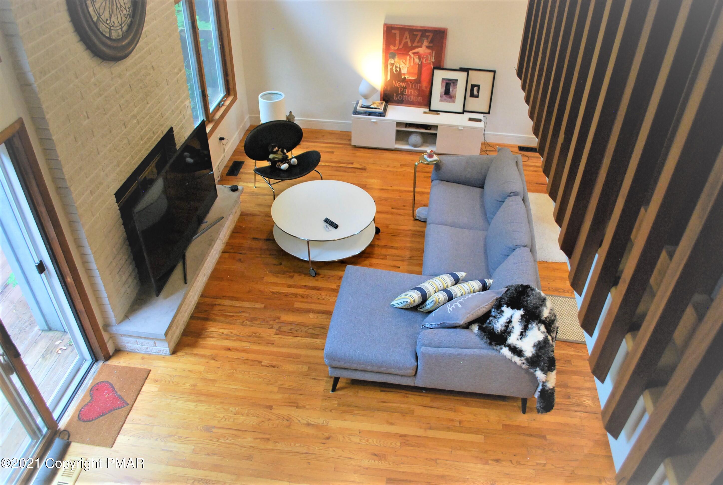 178 Edinburgh Road Bushkill, PA 18324 - Photo 8 of 54 a room with furniture and wooden floor