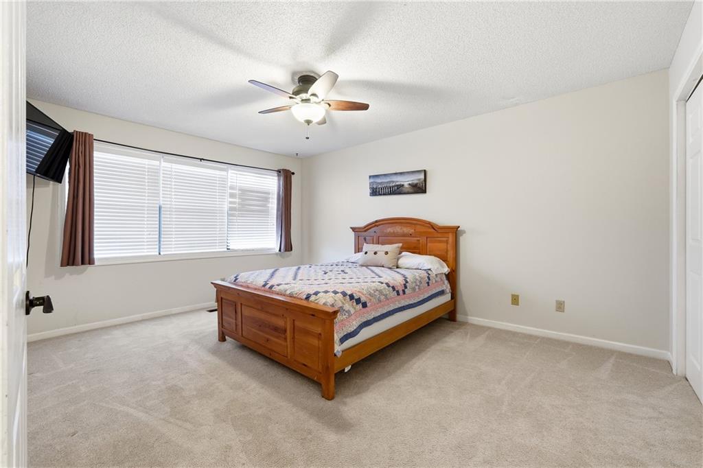 408 Alpine Drive Jasper, GA 30143 - Photo 11 of 42 a bedroom with a bed and window