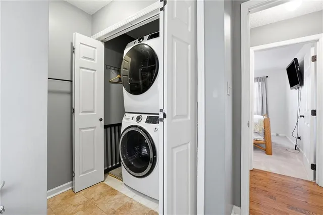 a view of a hallway with washer and dryer