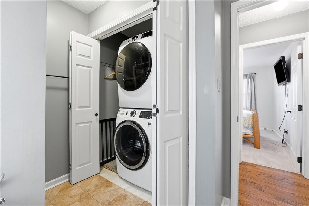 408 Alpine Drive Jasper, GA 30143 - Photo 15 of 42 a view of a hallway with washer and dryer