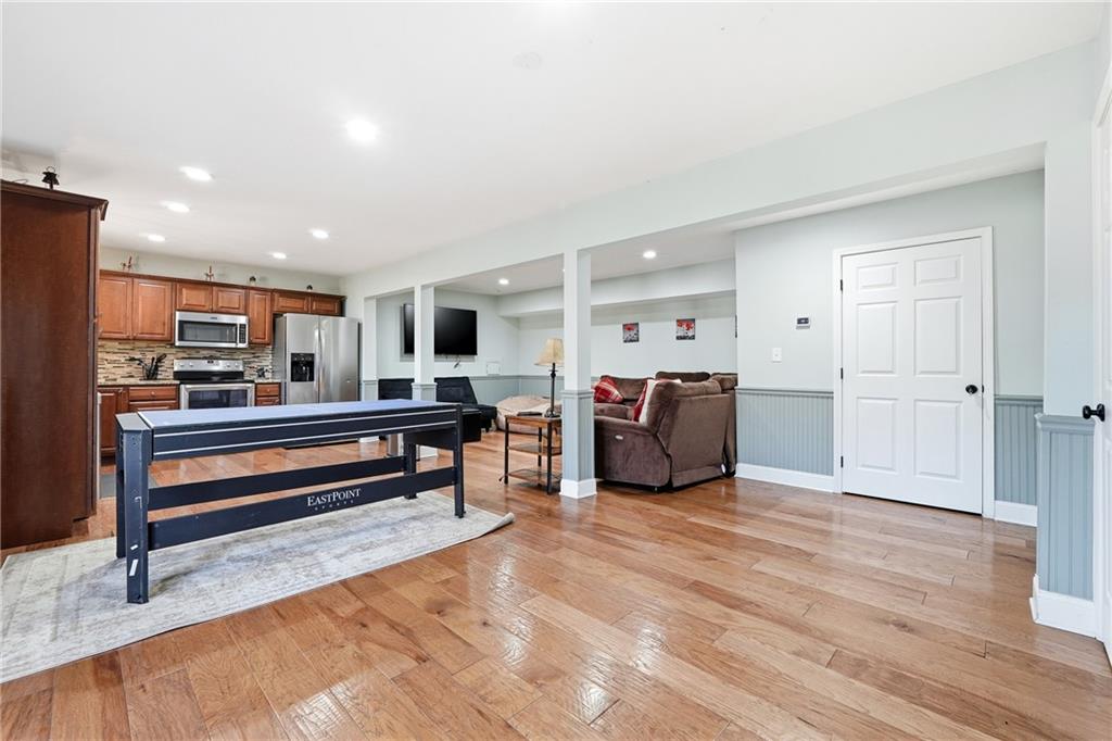 408 Alpine Drive Jasper, GA 30143 - Photo 16 of 42 a living room with furniture and wooden floor