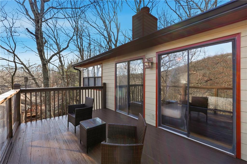 408 Alpine Drive Jasper, GA 30143 - Photo 22 of 42 a view of a balcony with chairs