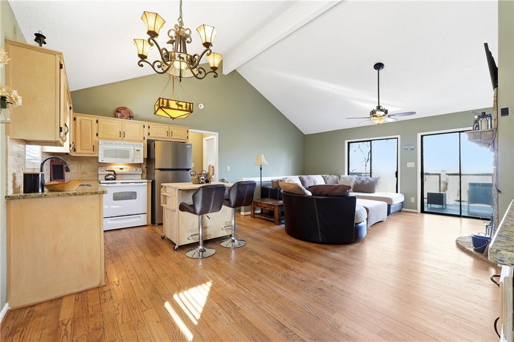 408 Alpine Drive Jasper, GA 30143 - Photo 5 of 42 a living room with fireplace furniture and a chandelier