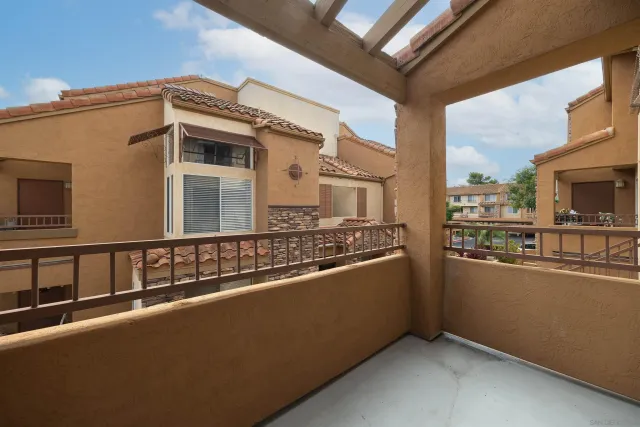 a view of a building from a balcony