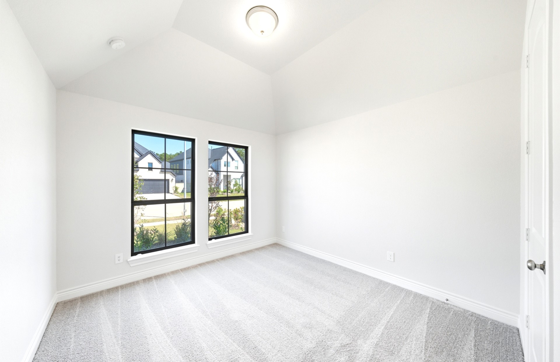 38642 Night Brood Court Magnolia, TX 77354 - Photo 21 of 32 an empty room with windows