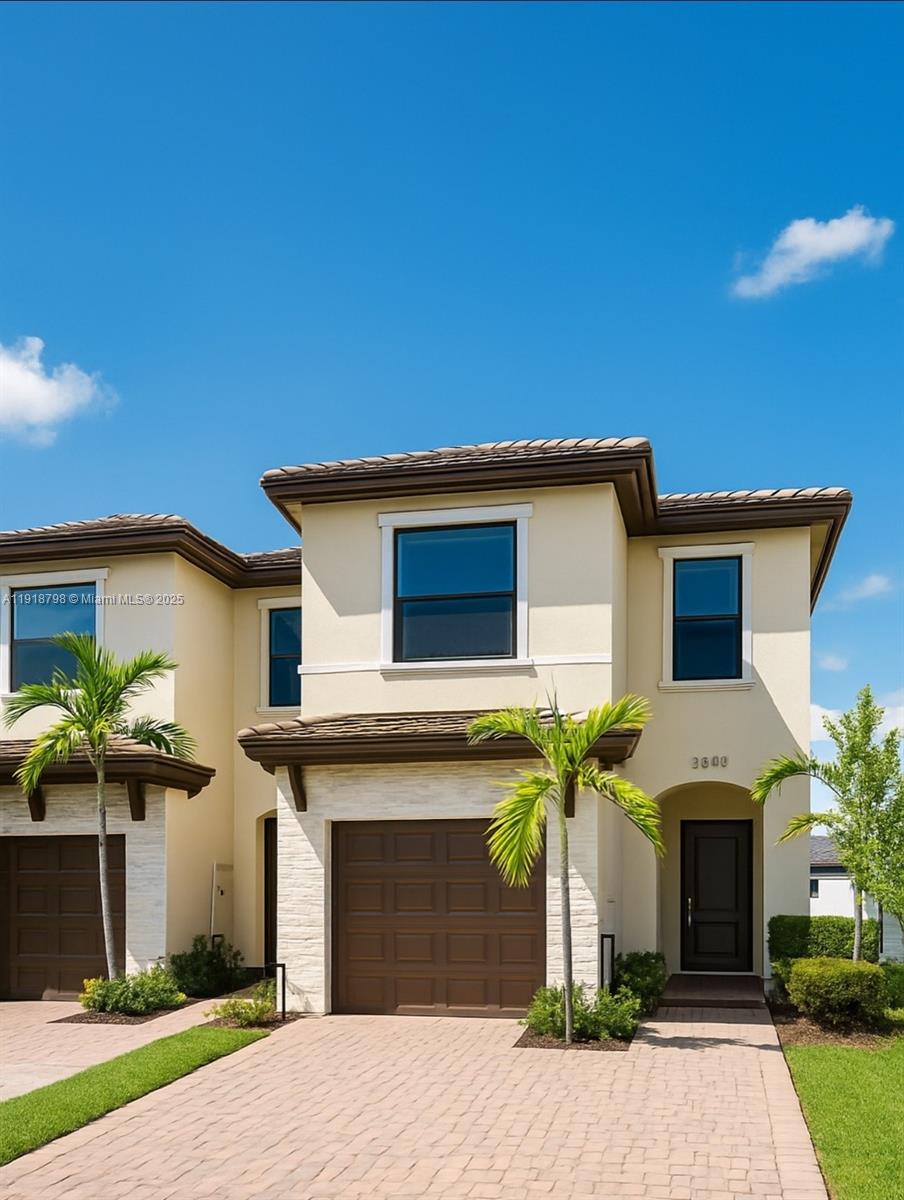 a house view with a garden space