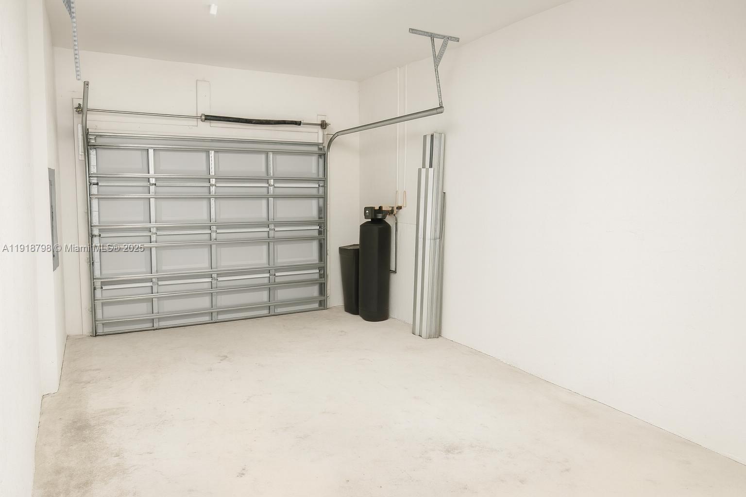 25564 Southwest 108th Avenue, Unit 25564 Homestead, FL 33032 - Photo 16 of 17 a view of empty room with closet