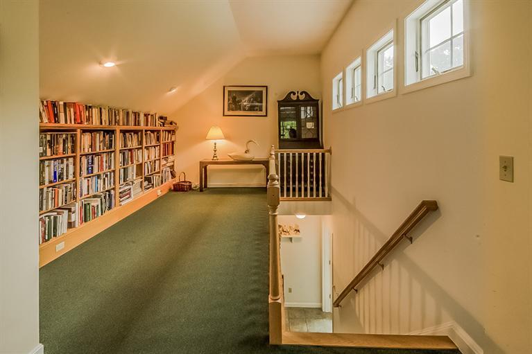53 Sandy Neck Road East Sandwich, MA 02537 - Photo 24 of 28 a balcony with wooden floor stairs and furniture