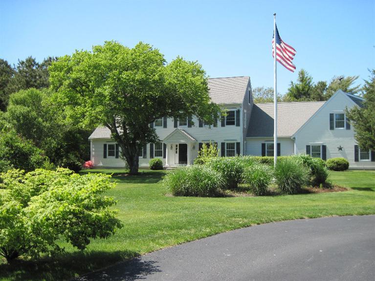 53 Sandy Neck Road East Sandwich, MA 02537 - Photo 3 of 28 a front view of house with yard and green space