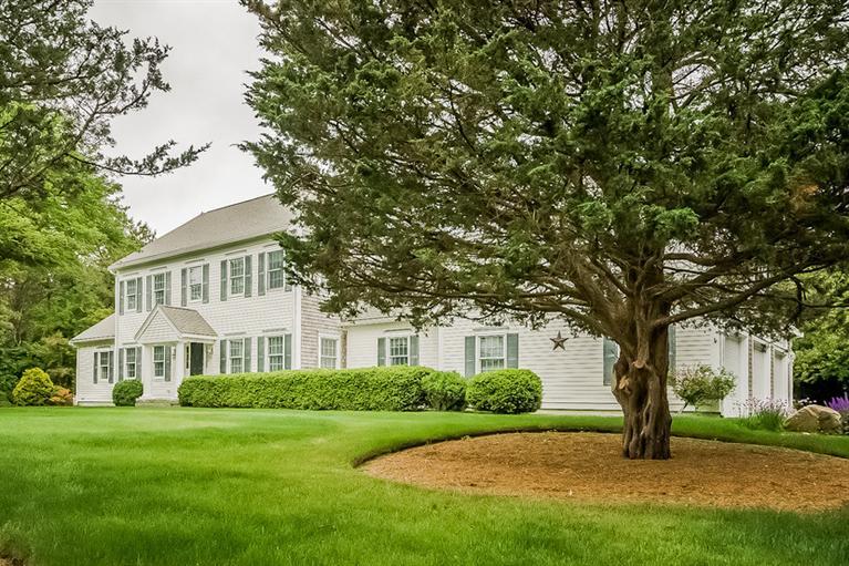 53 Sandy Neck Road East Sandwich, MA 02537 - Photo 6 of 28 a front view of a house with garden