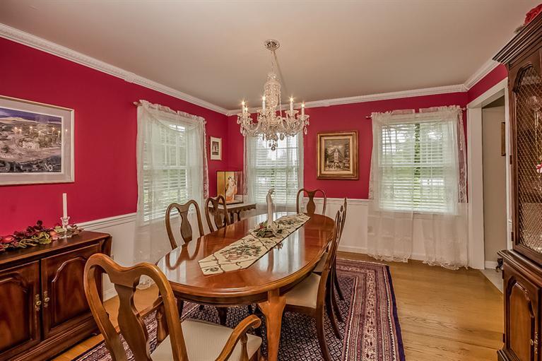 53 Sandy Neck Road East Sandwich, MA 02537 - Photo 7 of 28 a view of a dining room with furniture window and outside view