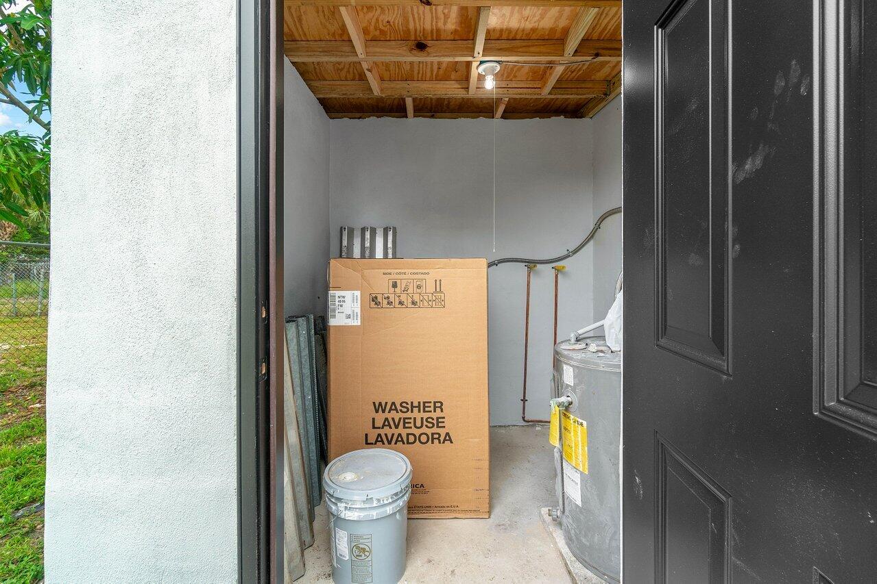 137 Southwest 9th Avenue Delray Beach, FL 33444 - Photo 23 of 27 a bathroom with a toilet and a shower