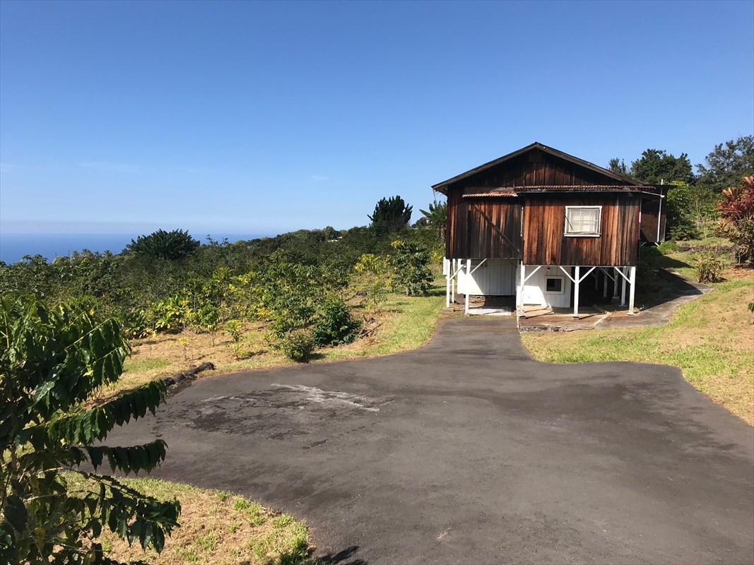 82-1033 Kiloa Road Captain Cook, HI 96704 - Photo 1 of 9 a view of a house with a yard