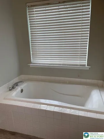 a bathroom with a bathtub