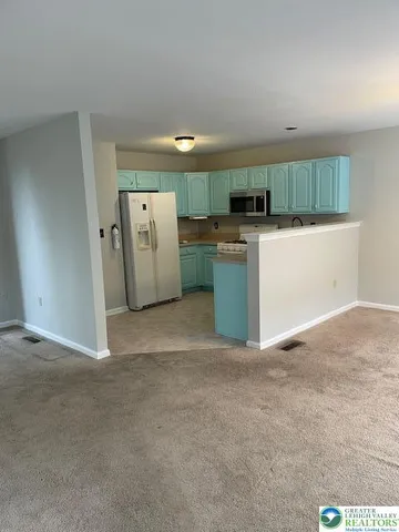 a view of kitchen with a sink