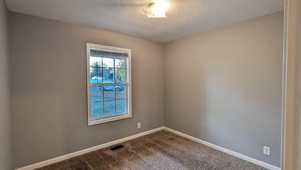a view of elevator with hallway