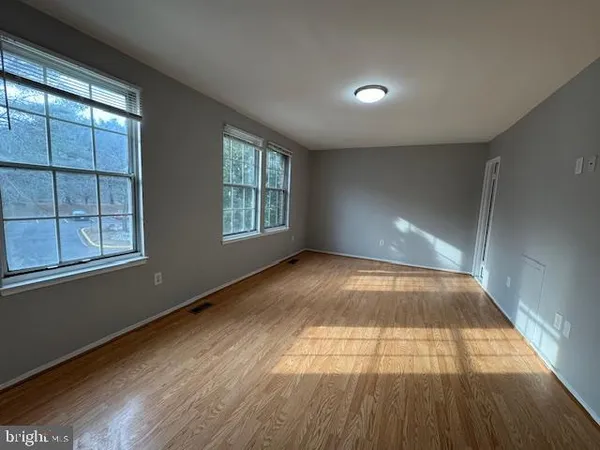 a view of empty room with windows