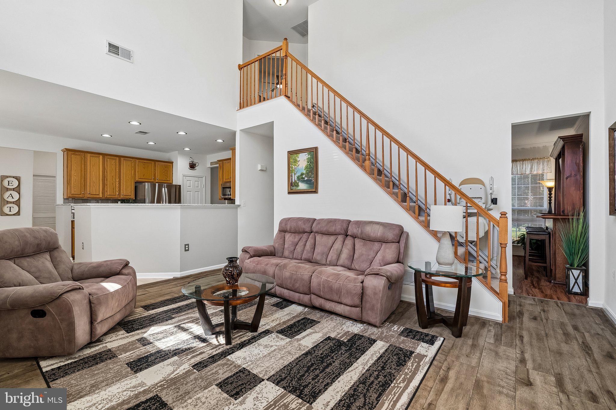 43351 Fullerton Street Ashburn, VA 20147 - Photo 16 of 41 a living room with furniture and wooden floor