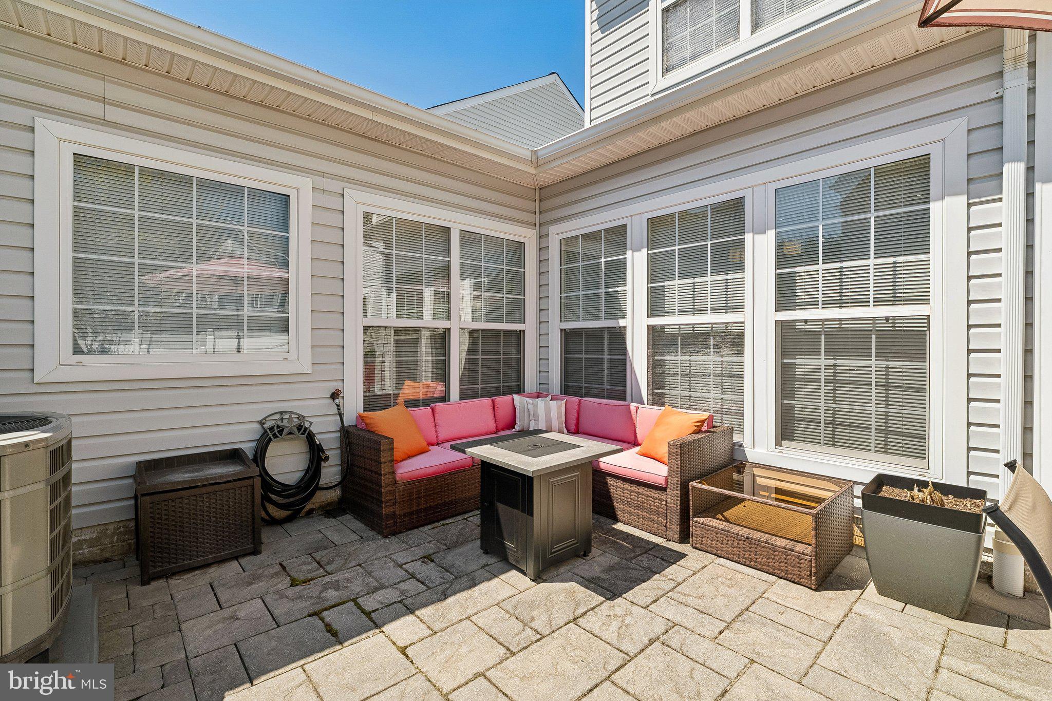 43351 Fullerton Street Ashburn, VA 20147 - Photo 29 of 41 a outdoor space with patio furniture and a couch