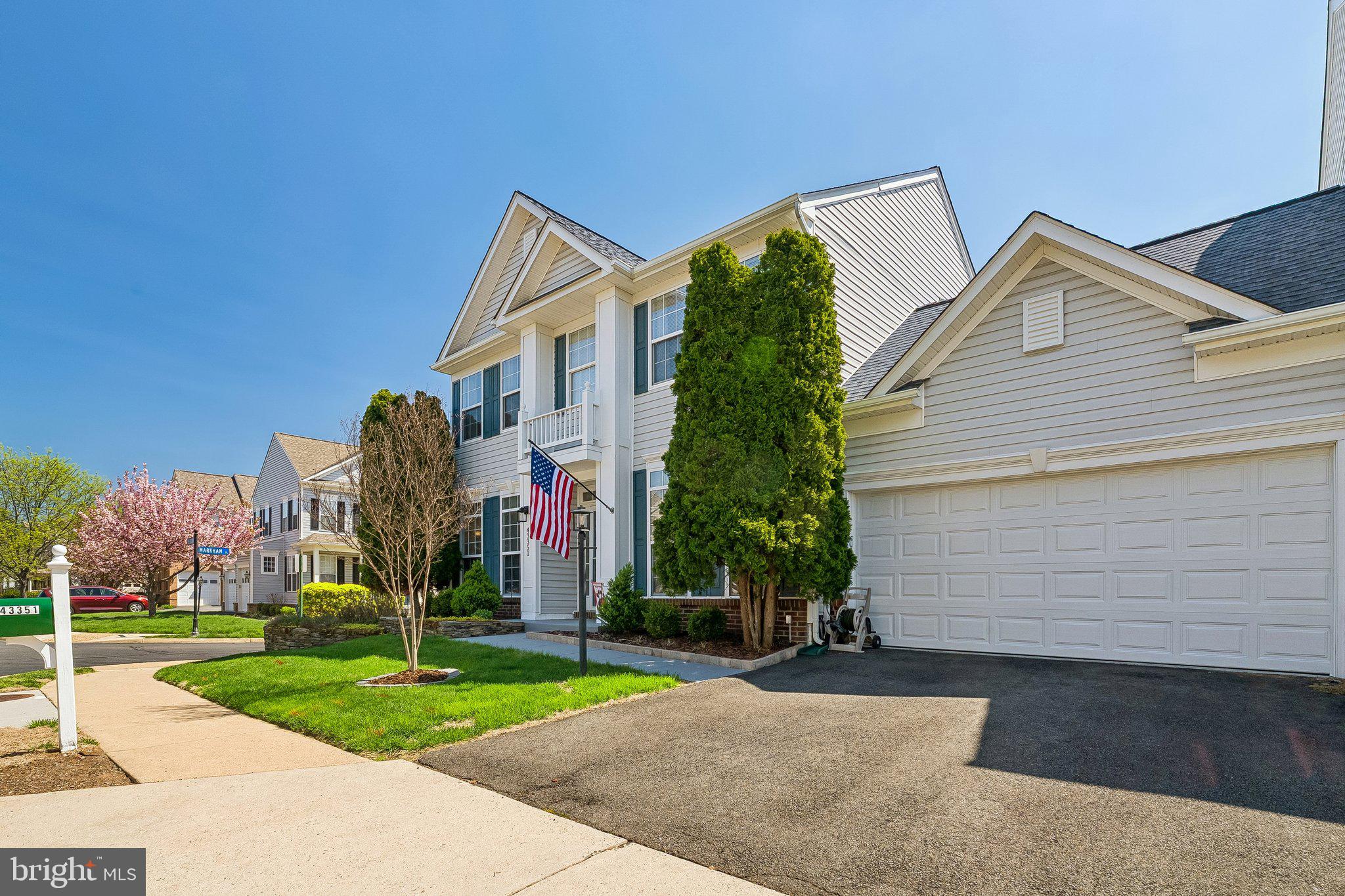 43351 Fullerton Street Ashburn, VA 20147 - Photo 33 of 41 a view of a house with a yard and plants