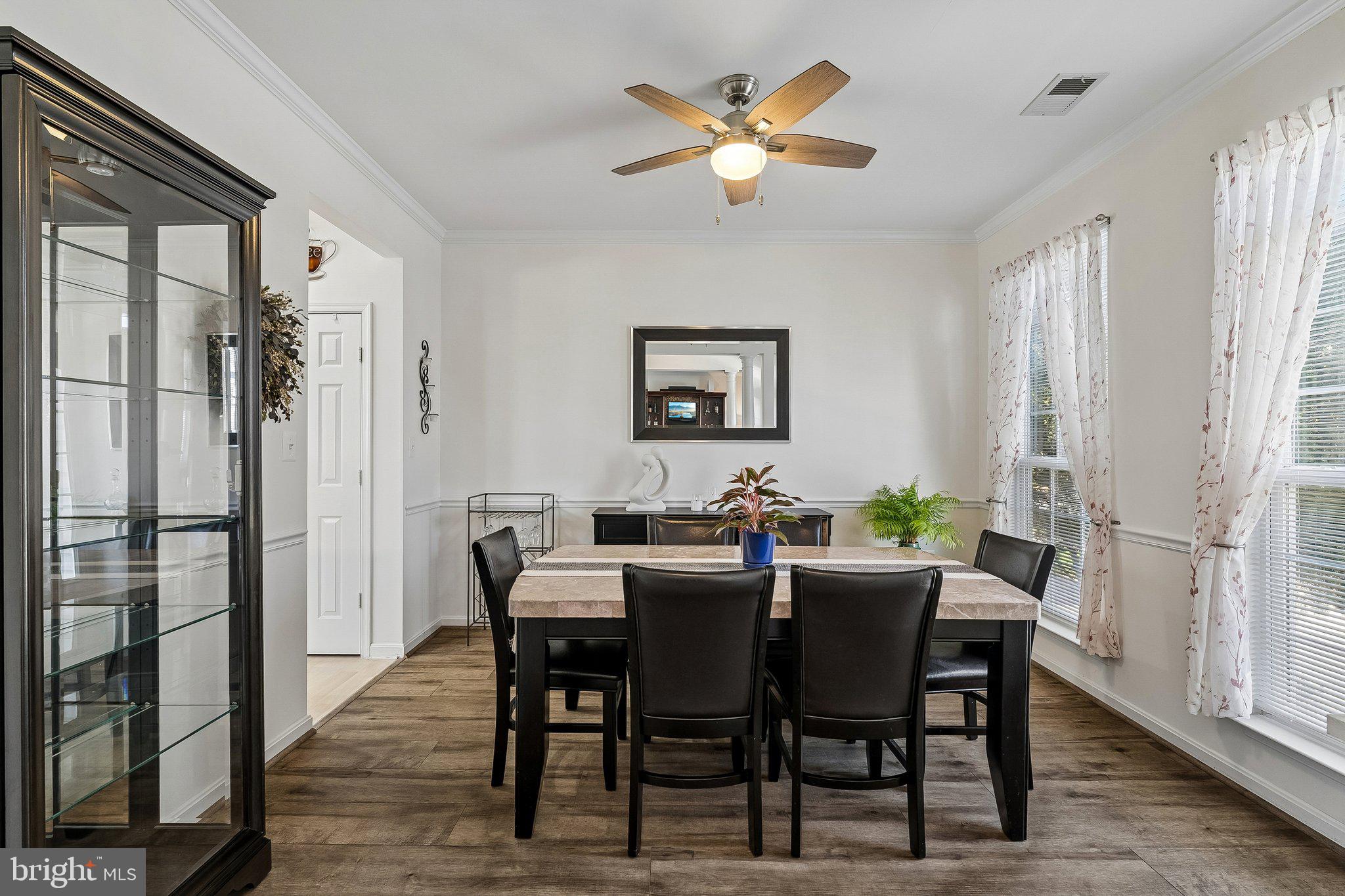 43351 Fullerton Street Ashburn, VA 20147 - Photo 5 of 41 a view of a dining room with furniture and window