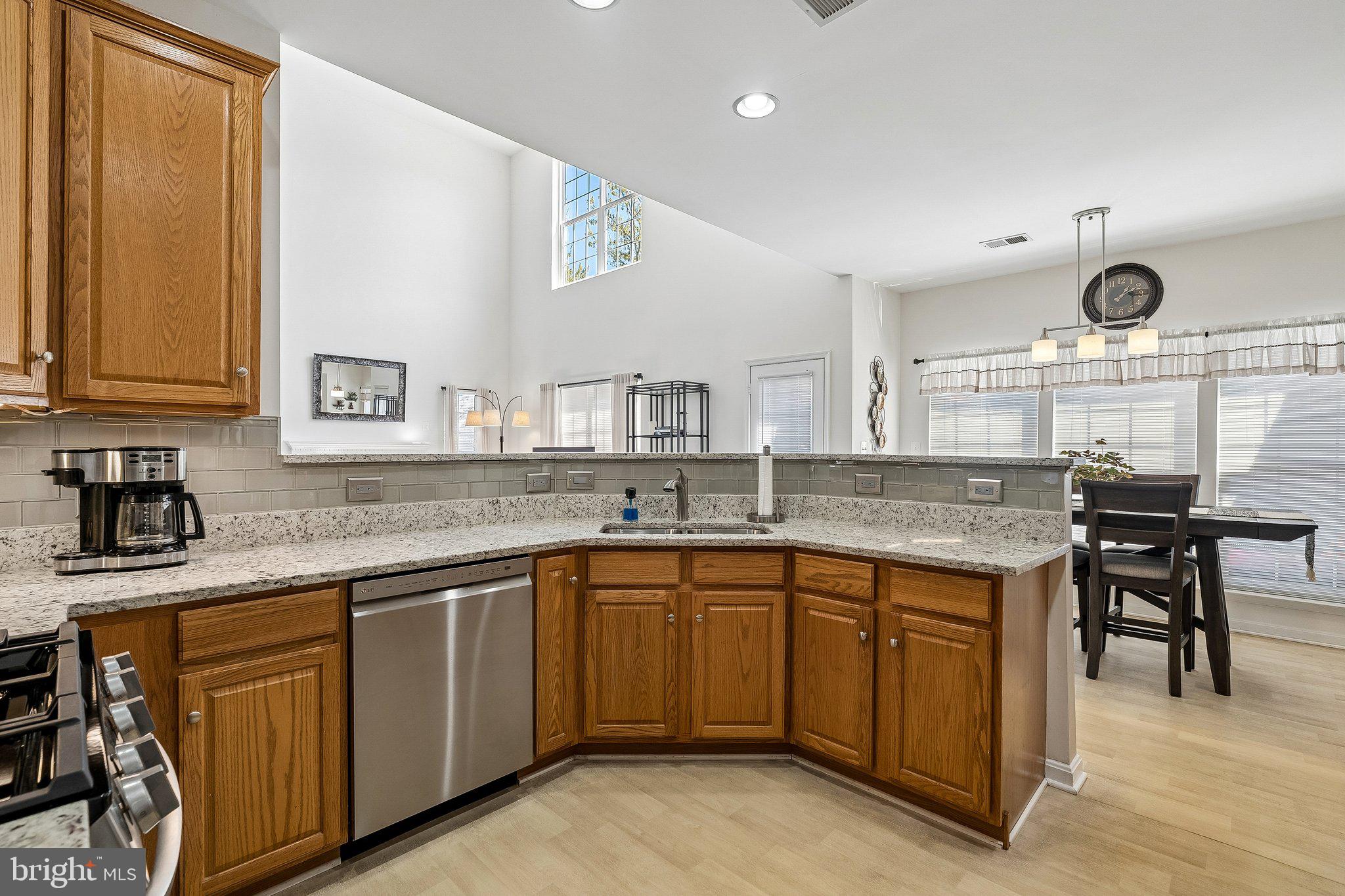43351 Fullerton Street Ashburn, VA 20147 - Photo 10 of 41 a kitchen with a sink and cabinets
