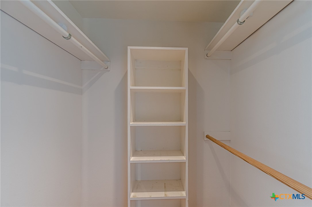 1122 Colorado Street, Unit 1409 Austin, TX 78701 - Photo 18 of 32 a view of an empty walk in closet