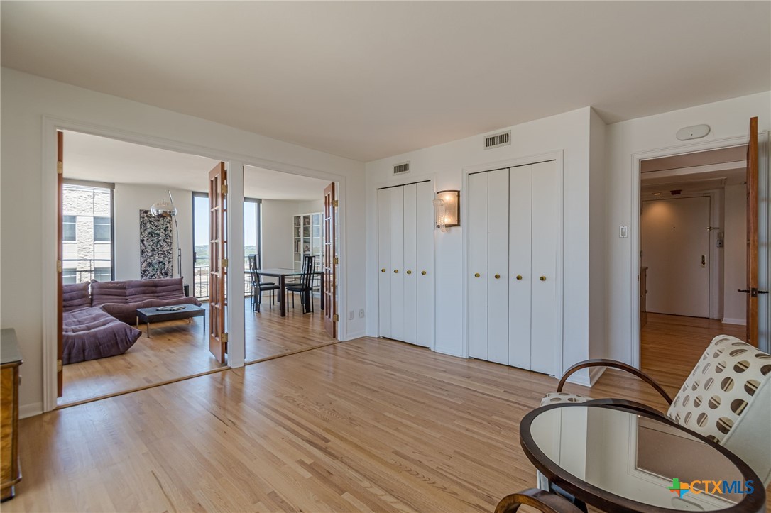 1122 Colorado Street, Unit 1409 Austin, TX 78701 - Photo 21 of 32 a view of a livingroom with wooden floor