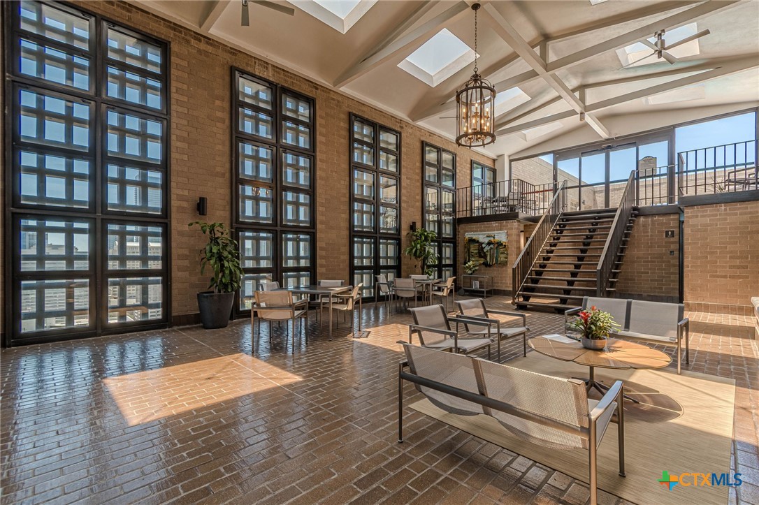 1122 Colorado Street, Unit 1409 Austin, TX 78701 - Photo 26 of 32 a view of a livingroom with furniture and window