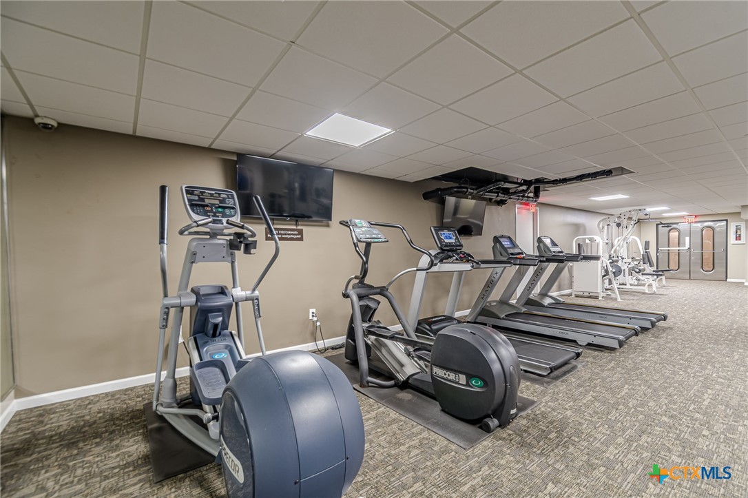 1122 Colorado Street, Unit 1409 Austin, TX 78701 - Photo 28 of 32 a view of a room with gym equipment