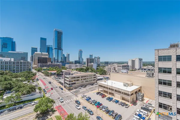 a view of a city with tall buildings