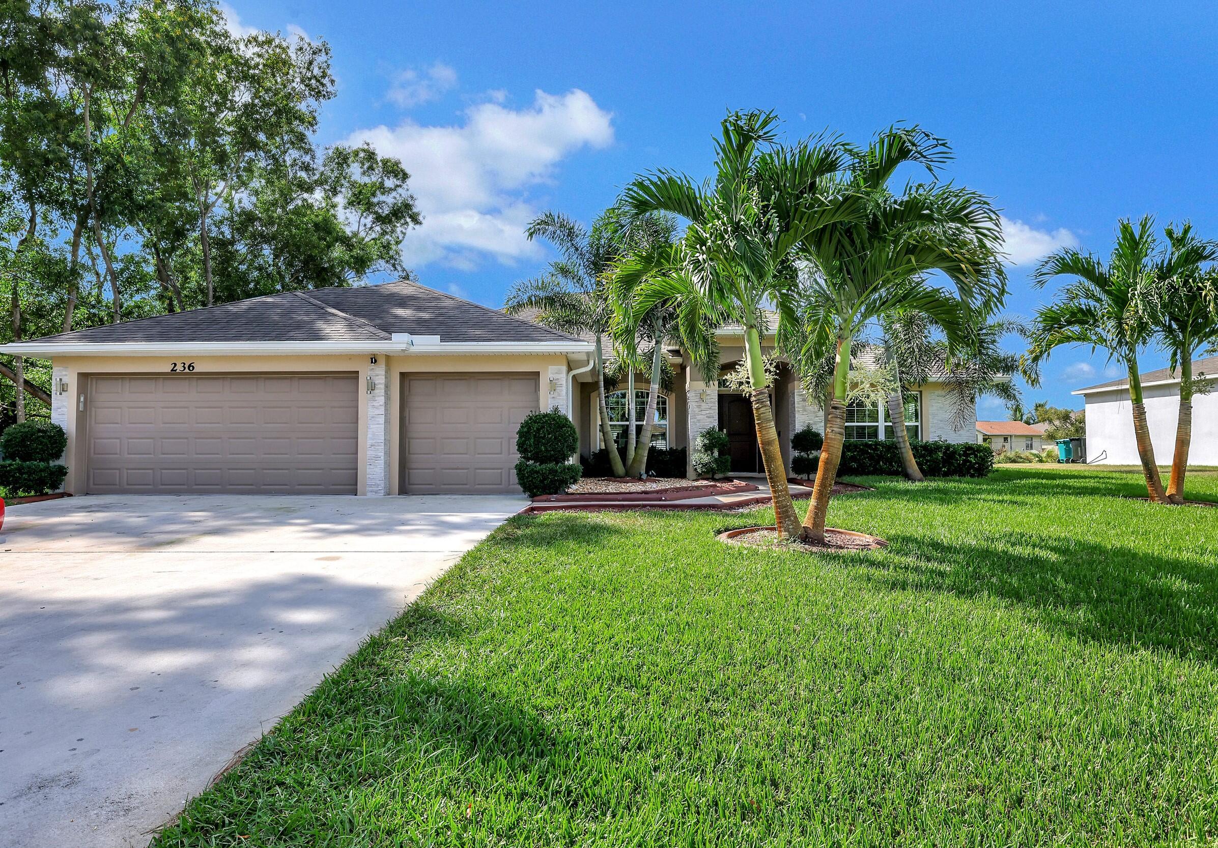 236 Southwest Covington Road Port St. Lucie, FL 34953 - Photo 3 of 39 front of the house