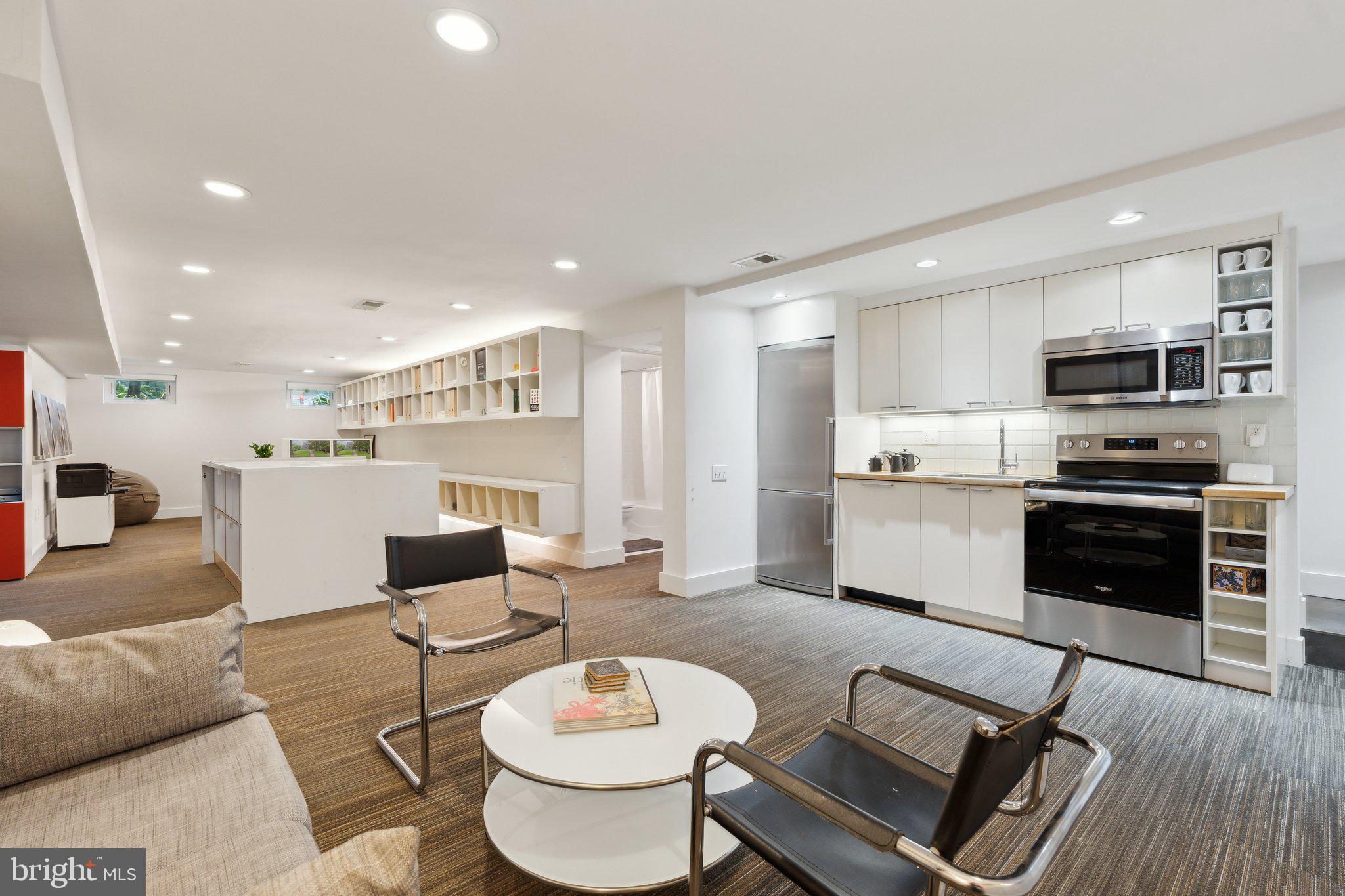 5929 Onondaga Road Bethesda, MD 20816 - Photo 27 of 47 a kitchen with a table and chairs
