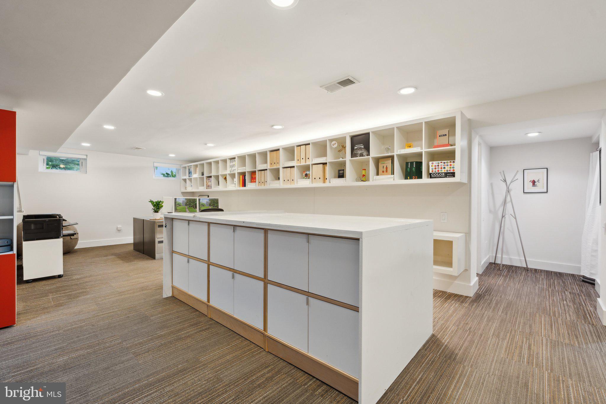 5929 Onondaga Road Bethesda, MD 20816 - Photo 29 of 47 a living room with stainless steel appliances kitchen island granite countertop a refrigerator a stove a sink and a cabinets with wooden floor