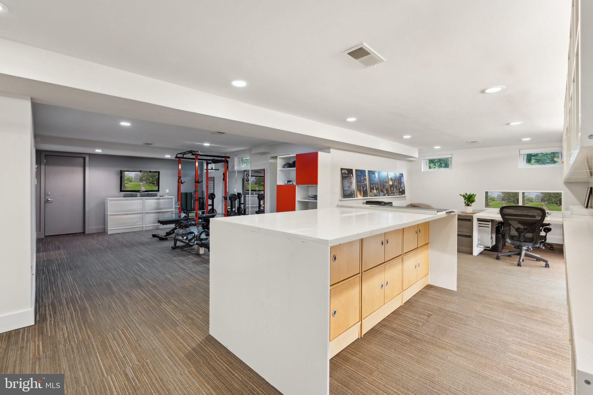 5929 Onondaga Road Bethesda, MD 20816 - Photo 30 of 47 a kitchen with stainless steel appliances kitchen island granite countertop a stove and a wooden floors
