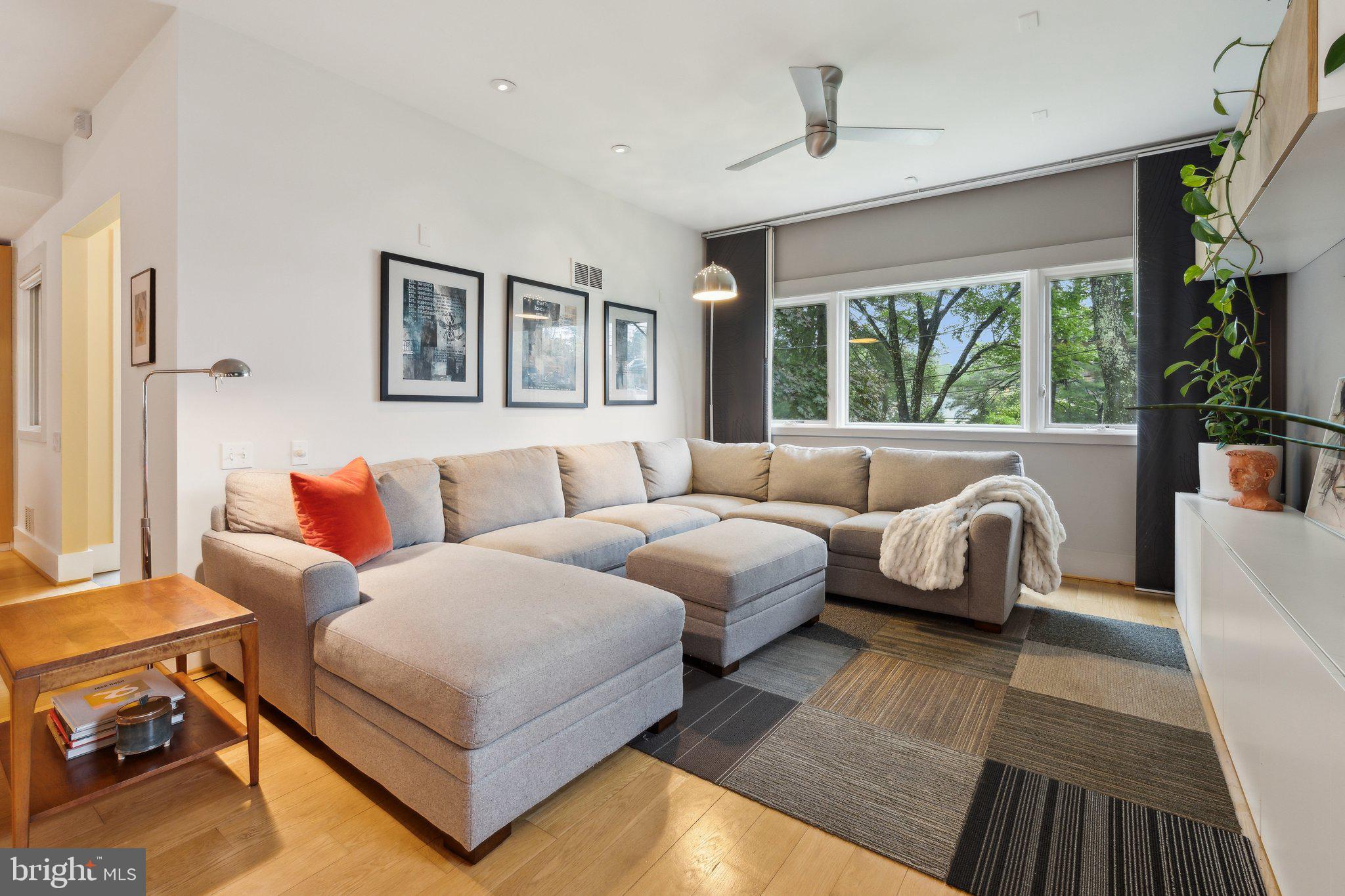 5929 Onondaga Road Bethesda, MD 20816 - Photo 3 of 47 a living room with furniture and a large window