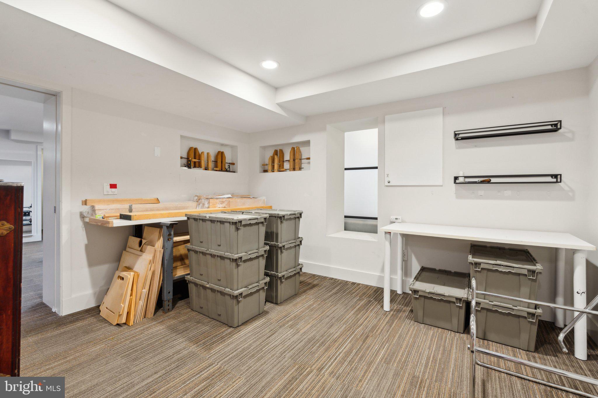 5929 Onondaga Road Bethesda, MD 20816 - Photo 33 of 47 a view of a workspace with furniture and wooden floor