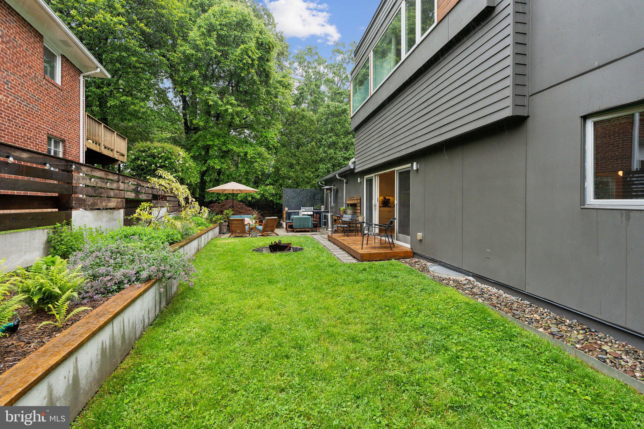 5929 Onondaga Road Bethesda, MD 20816 - Photo 35 of 47 a backyard of a house with seating space