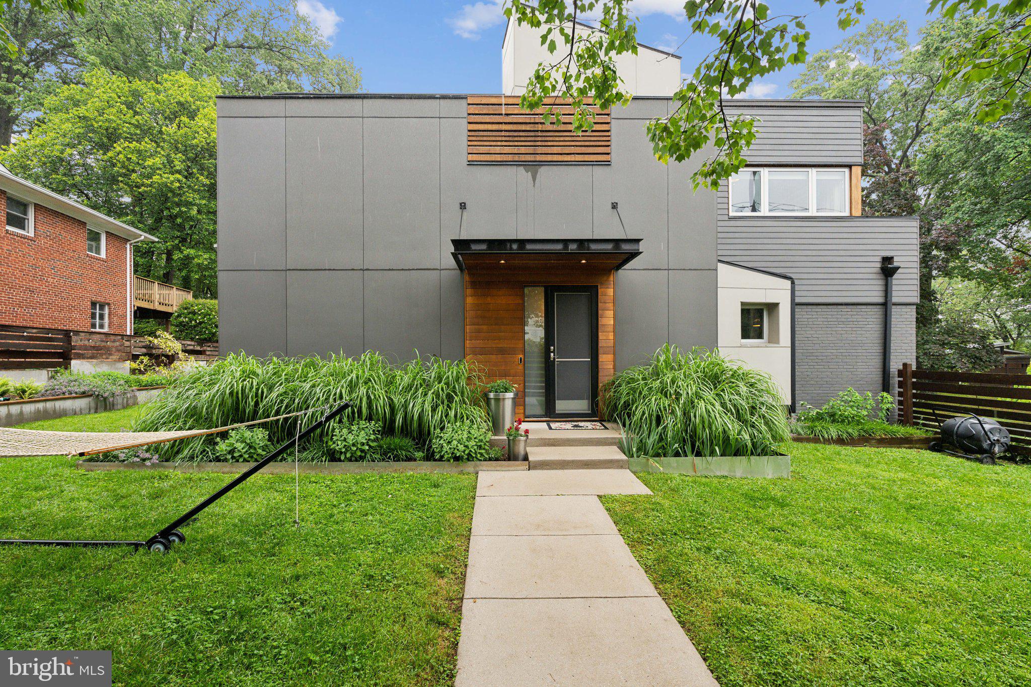 5929 Onondaga Road Bethesda, MD 20816 - Photo 37 of 47 a front view of a house with a yard