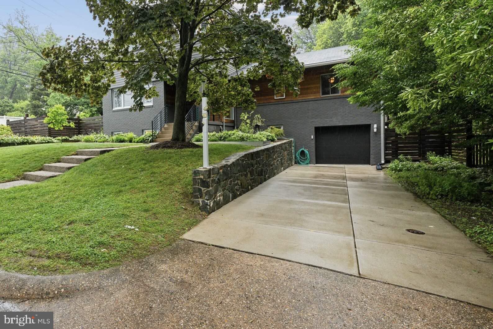 5929 Onondaga Road Bethesda, MD 20816 - Photo 42 of 47 a view of house with yard and trees