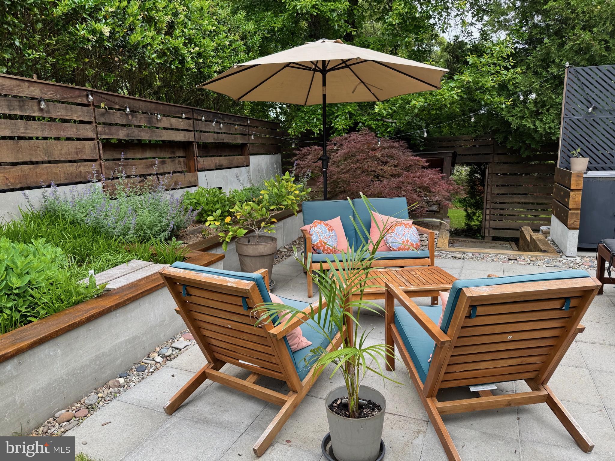 5929 Onondaga Road Bethesda, MD 20816 - Photo 43 of 47 a view of outdoor sitting area with furniture and wooden floor