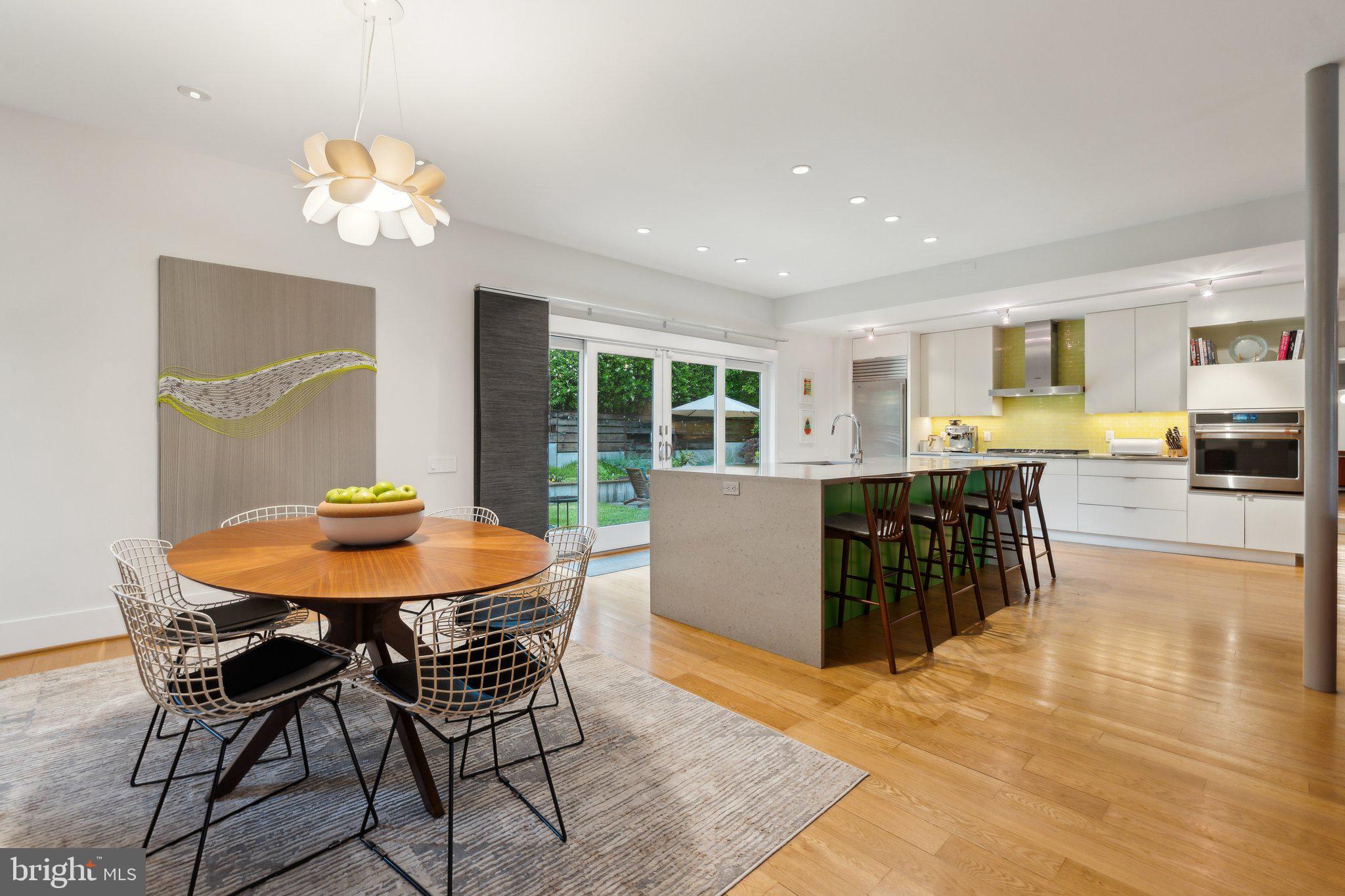 5929 Onondaga Road Bethesda, MD 20816 - Photo 5 of 47 a view of a dining room with furniture and a livingroom