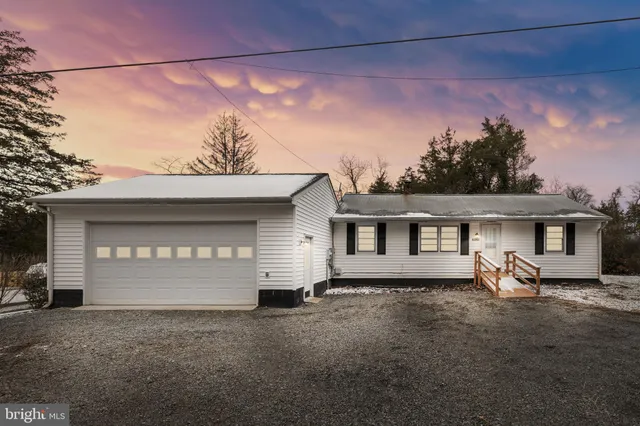 front view of a house with a street