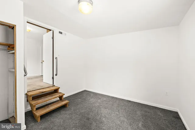 a view of a room with racks on the wall