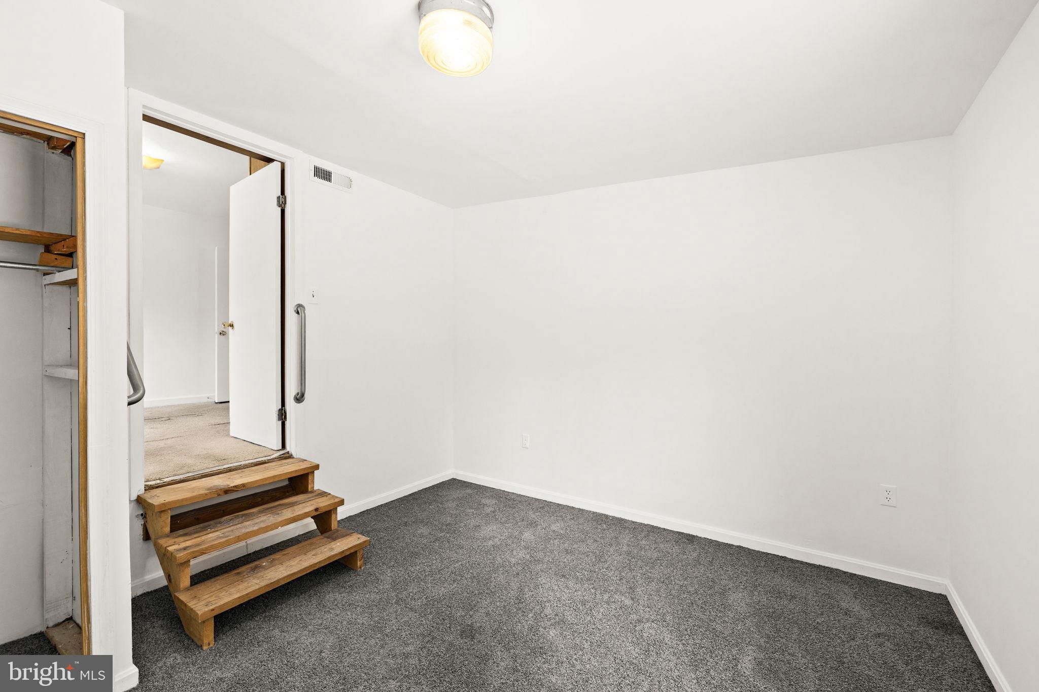 11604 Maple Tree Court Orange, VA 22960 - Photo 22 of 39 a view of a room with racks on the wall